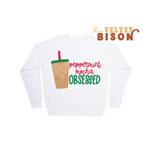 Load image into Gallery viewer, white sweater with iced coffee and the words peppermint mocha in red and obsessed in green
